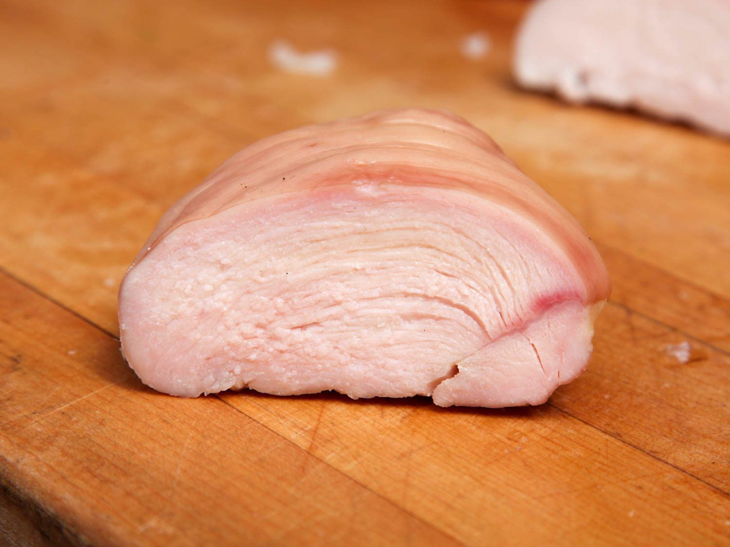 Cross section of salted chicken breast after cooking.