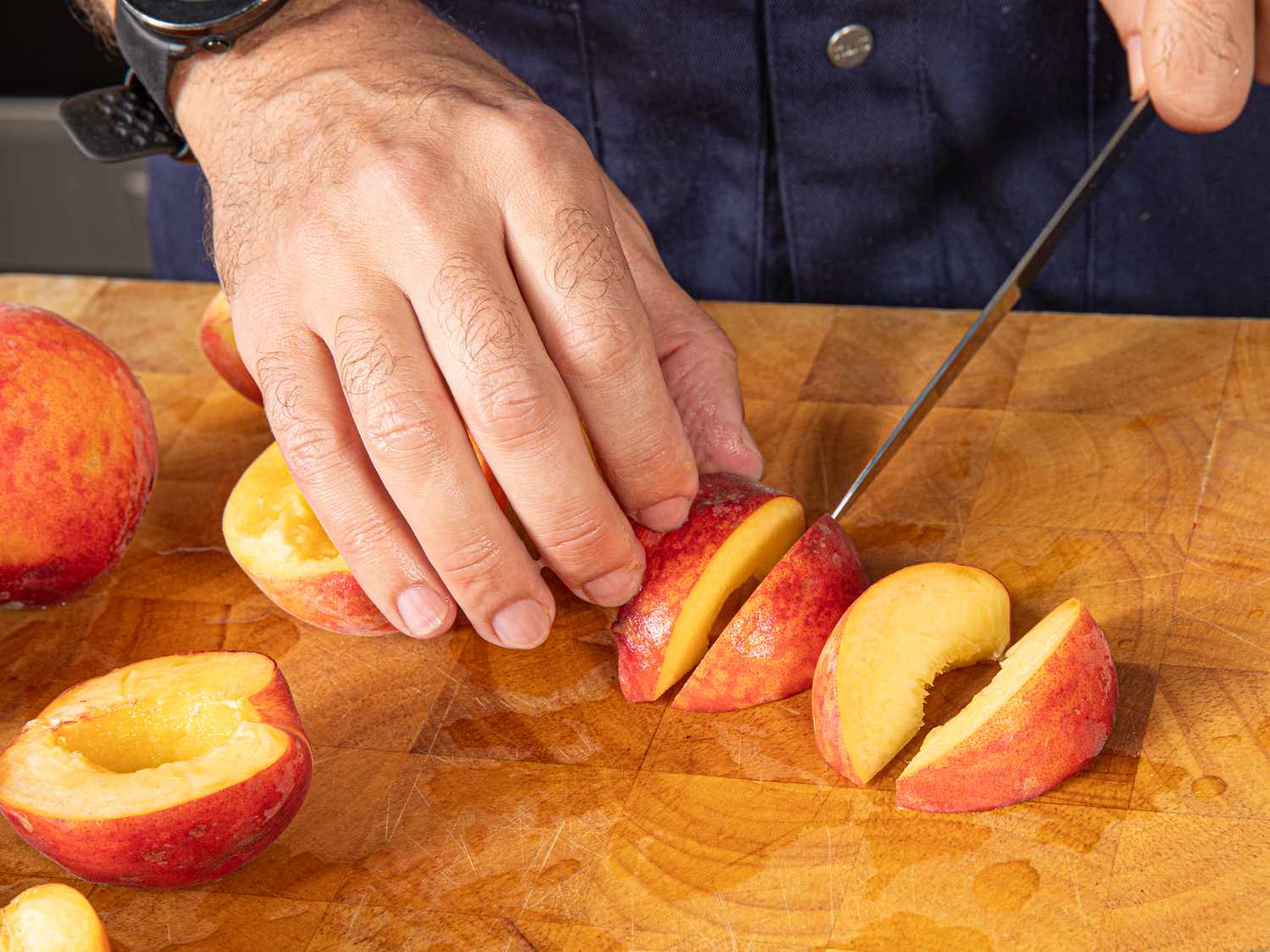 Side view of slices peaches in half 