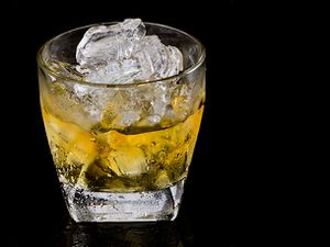 A glass of Irish whiskey on the rocks. 