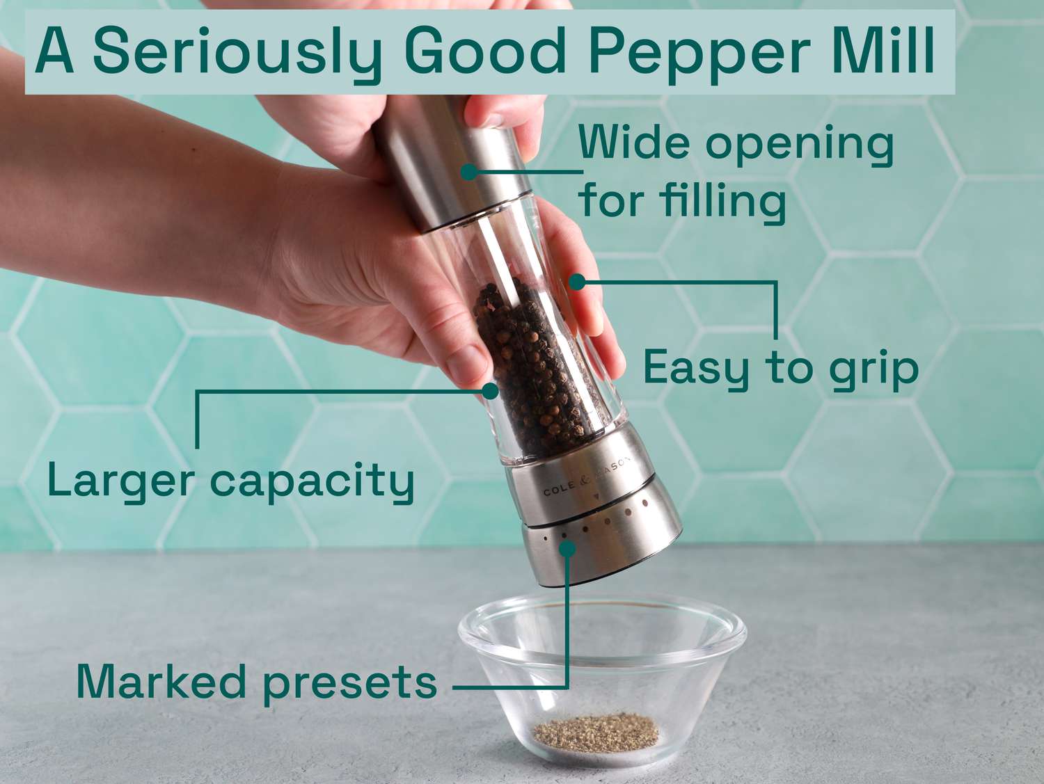 a person using the cole and mason pepper mill to grind pepper