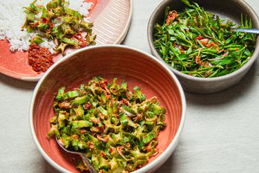 Angled view of multiple bowls of kerabu