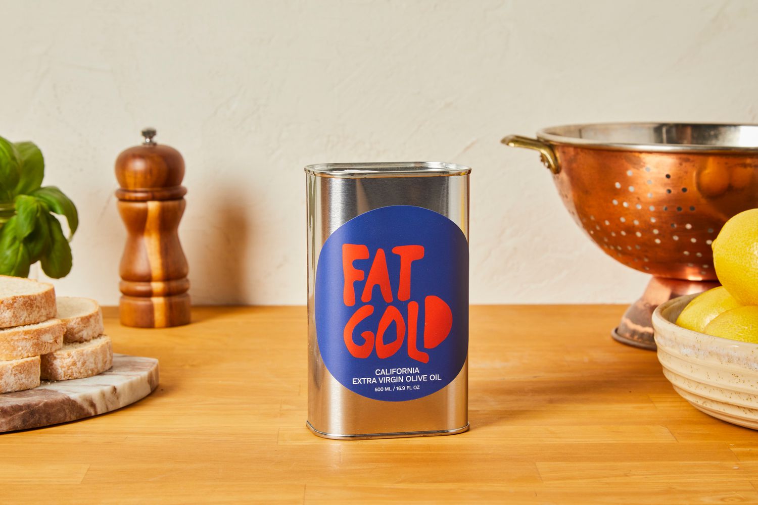 A tin of Fat Gold olive oill