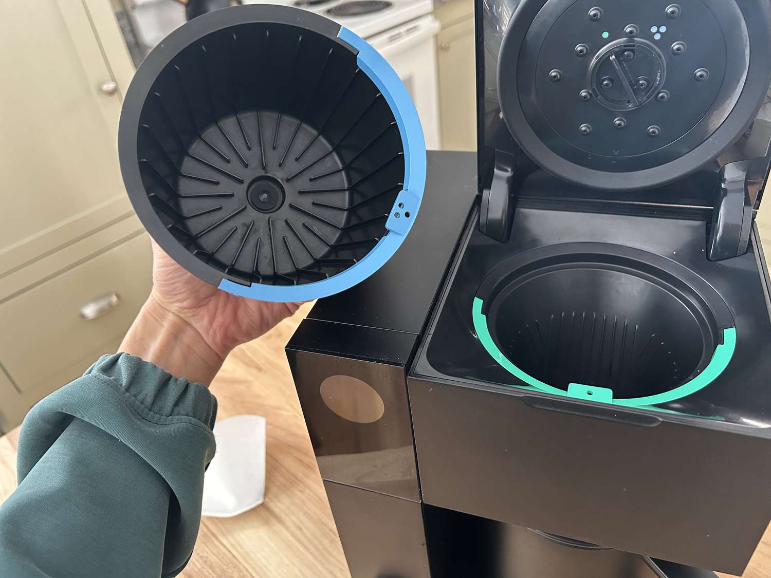 A side-by-side comparison of the Fellow Aiden's two different brew basket sizes.