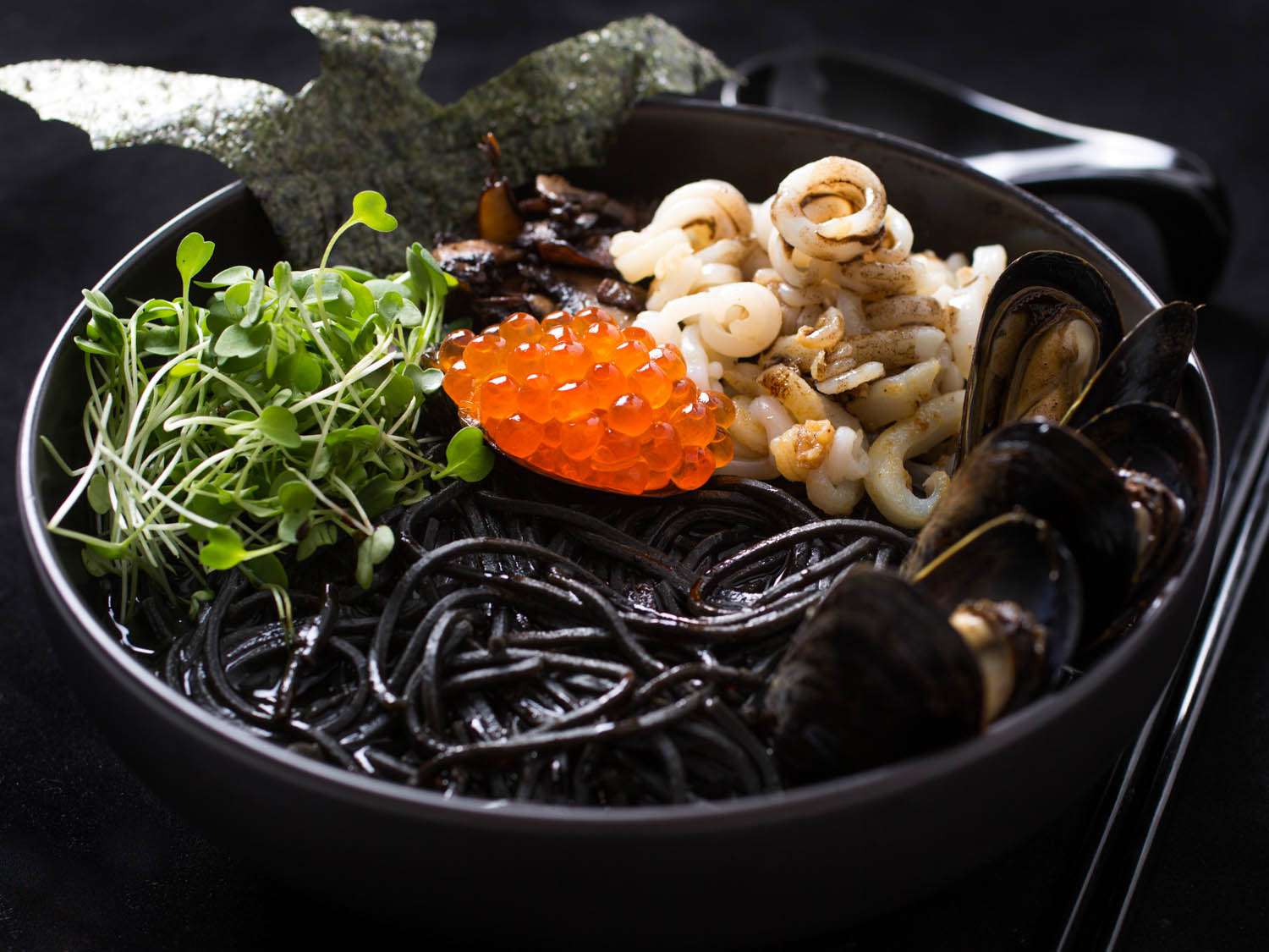 A black bowl of Halloween Seafood Ramen