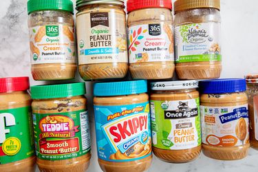 Jars of creamy peanut butter. 