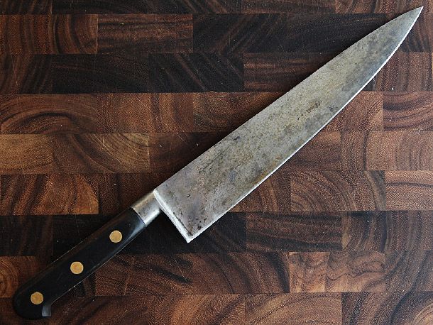Vintage Sabatier 8-Inch Chef's Knife on wood cutting board