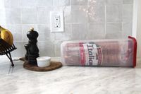 A loaf of bread in the Budeez bread box.