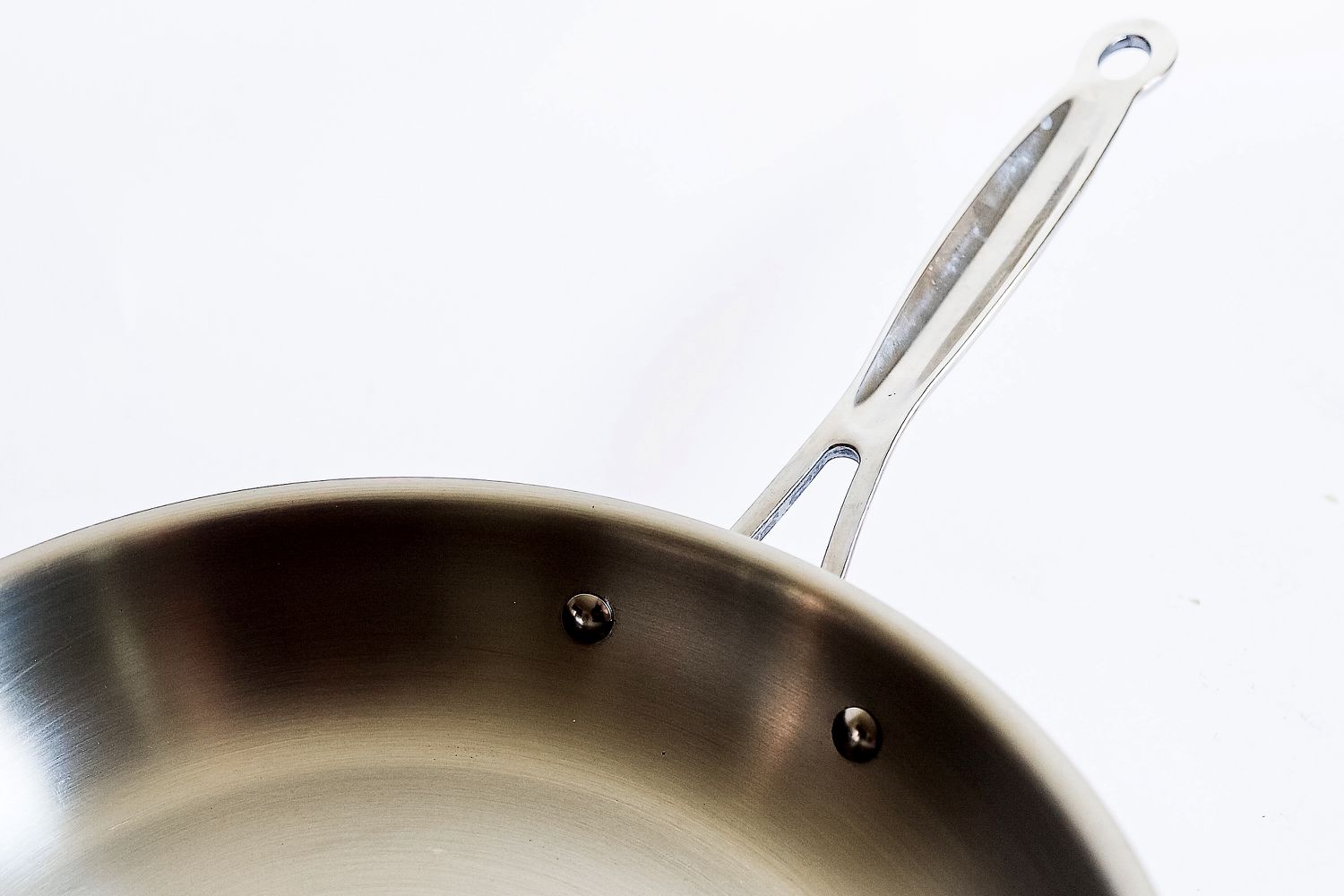 A handle of a pan from the Goldilocks 7-piece Cookware Set