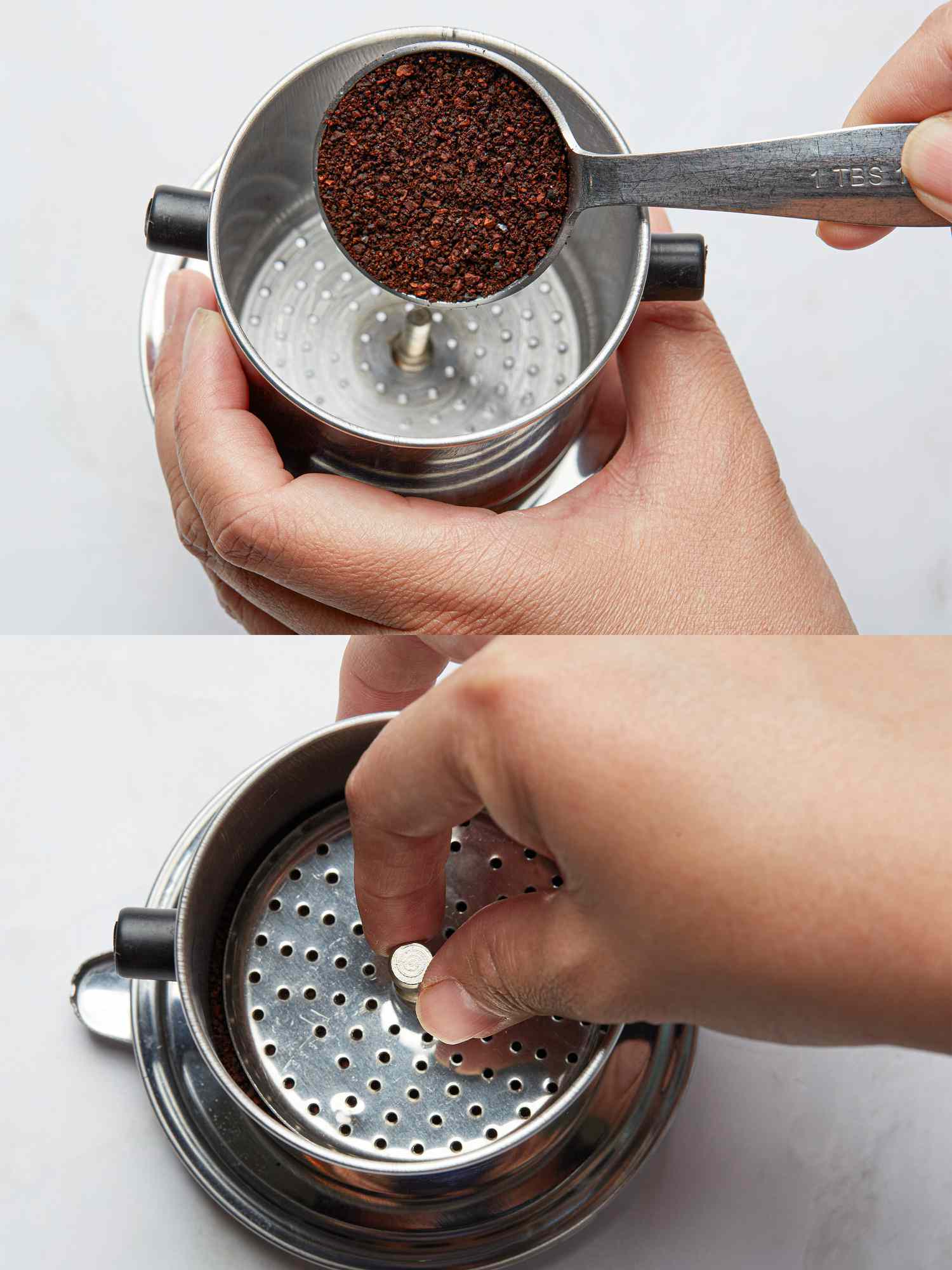 Placing coffee grounds in a phin filter.