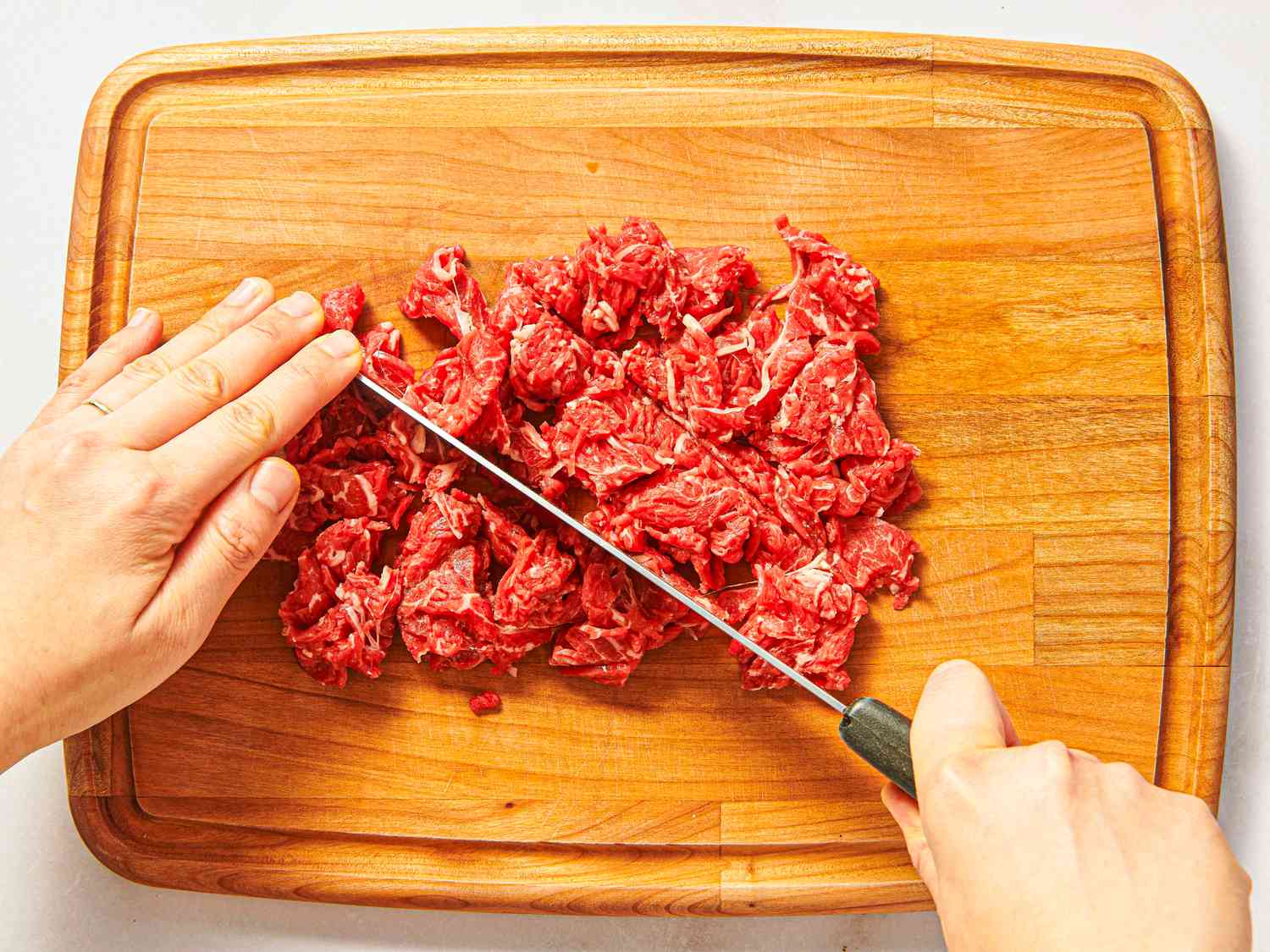 Overhead view of slicing meats
