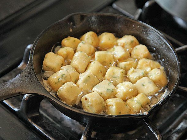 Parisian gnocchi in a cast iron pan with brown butter.