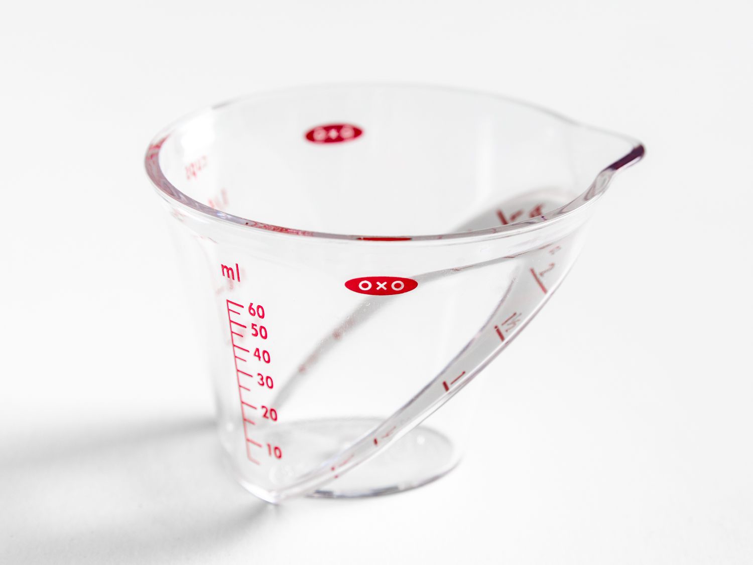 a close up of an oxo mini measuring cup
