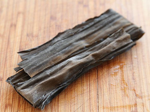 A sheet of kombu on a cutting board