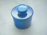the le creuset butter crock with the lid on 