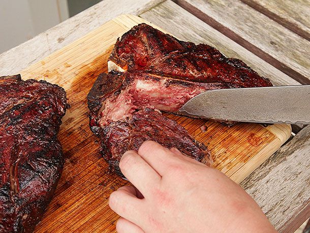 Author finishes cutting the tenderloin away from one of the porterhouses.