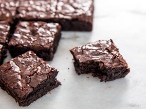 Brownies with crackly tops made from a homemade brownie mix
