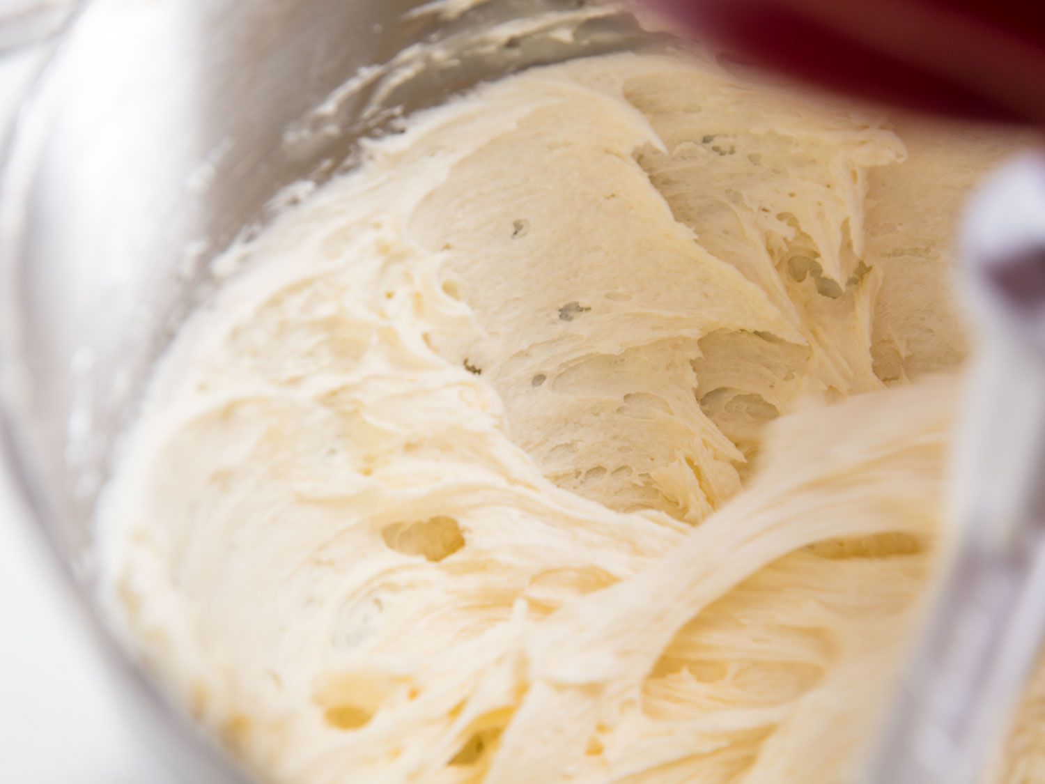 Butter in a stand mixer after being beaten until smooth. 