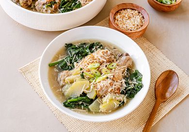 Chicken binakol served in white bowls.