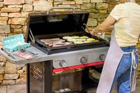 Food is cooked on the Weber Slate 28 inch Rust-Resistant 3 Burner Outdoor Griddle