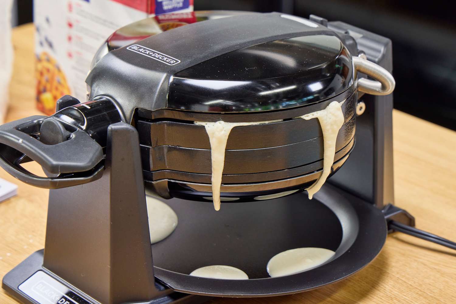 Batter drips down the sides of the Black+Decker Double Flip Rotating Waffle Maker