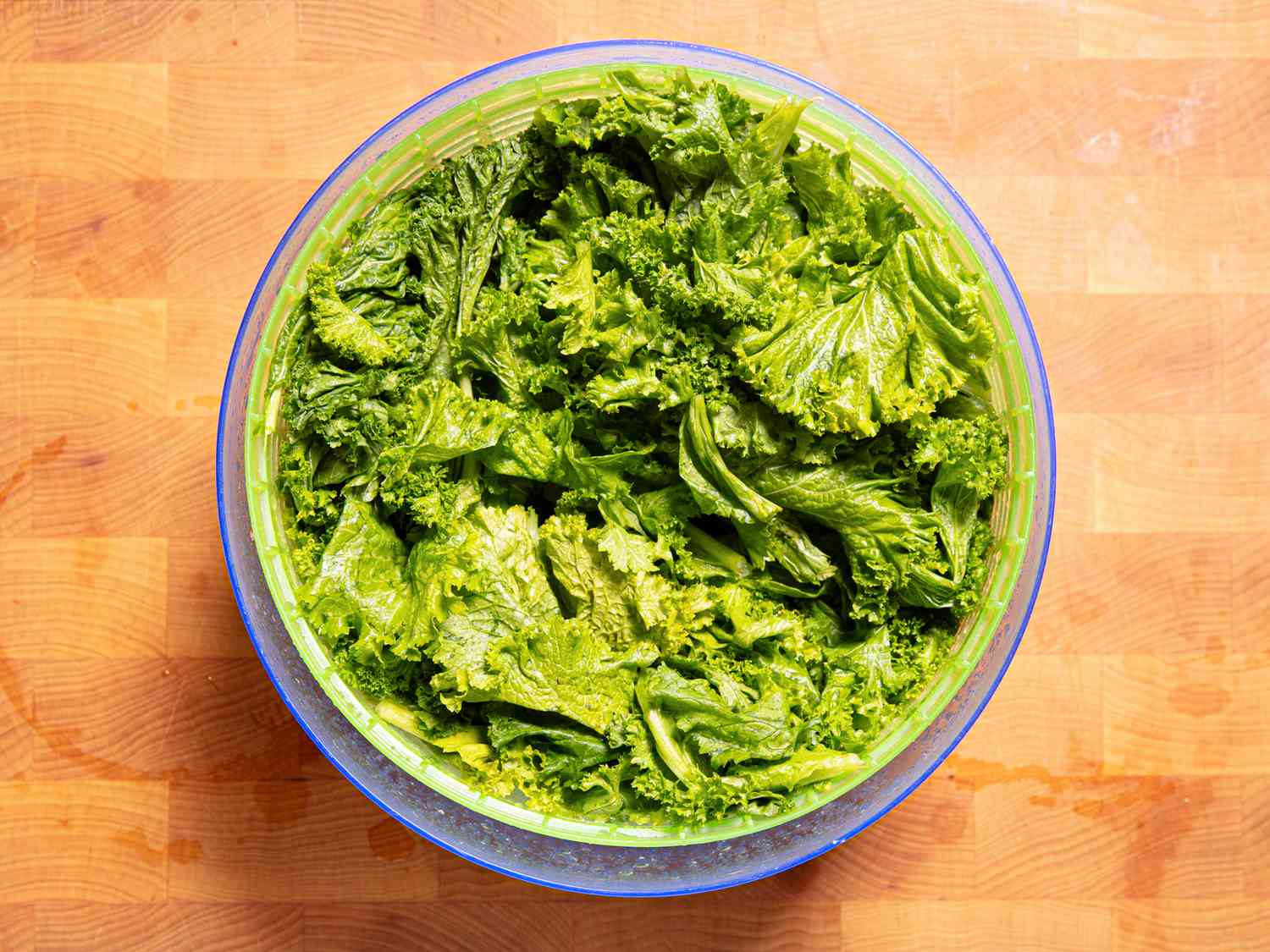 Overhead view of mustards in a salad spinner