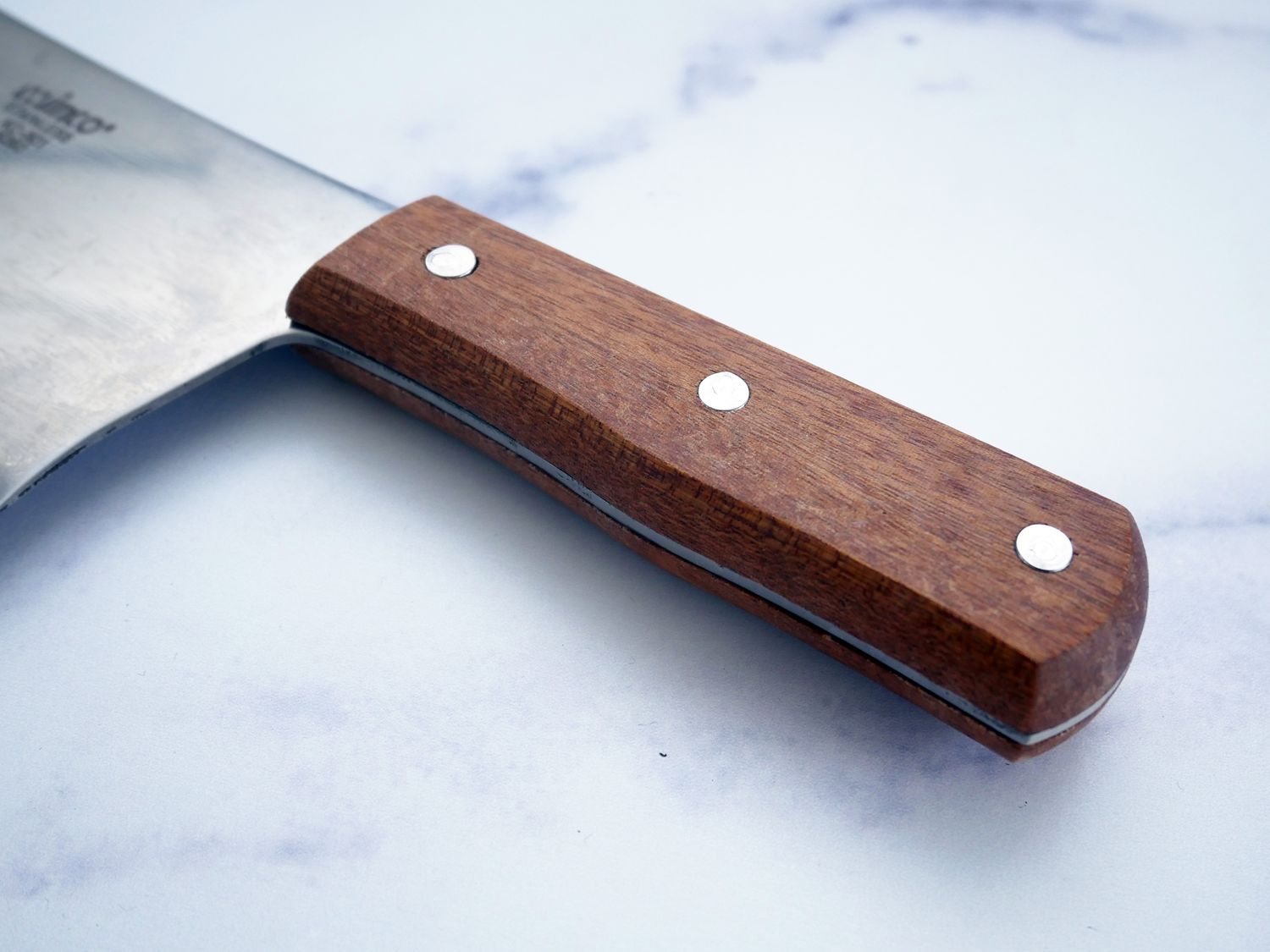 Closeup of handle of Winco 8" Heavy Duty Chinese Cleaver with Wooden Handle