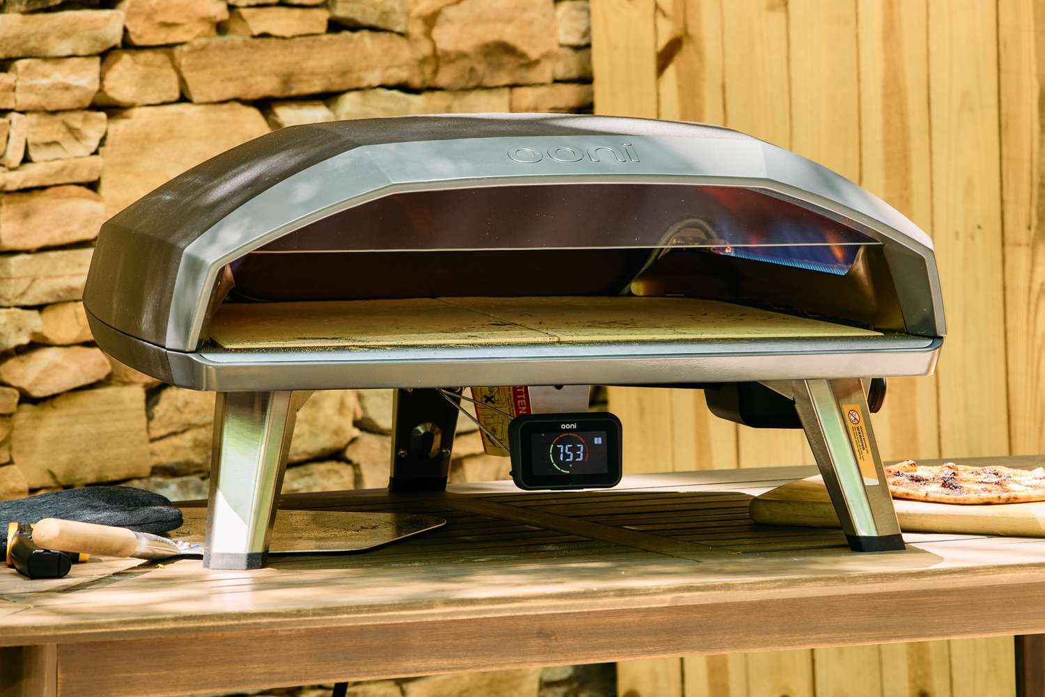 The Ooni Koda 2 Max Gas Powered Pizza Oven on an outdoor table