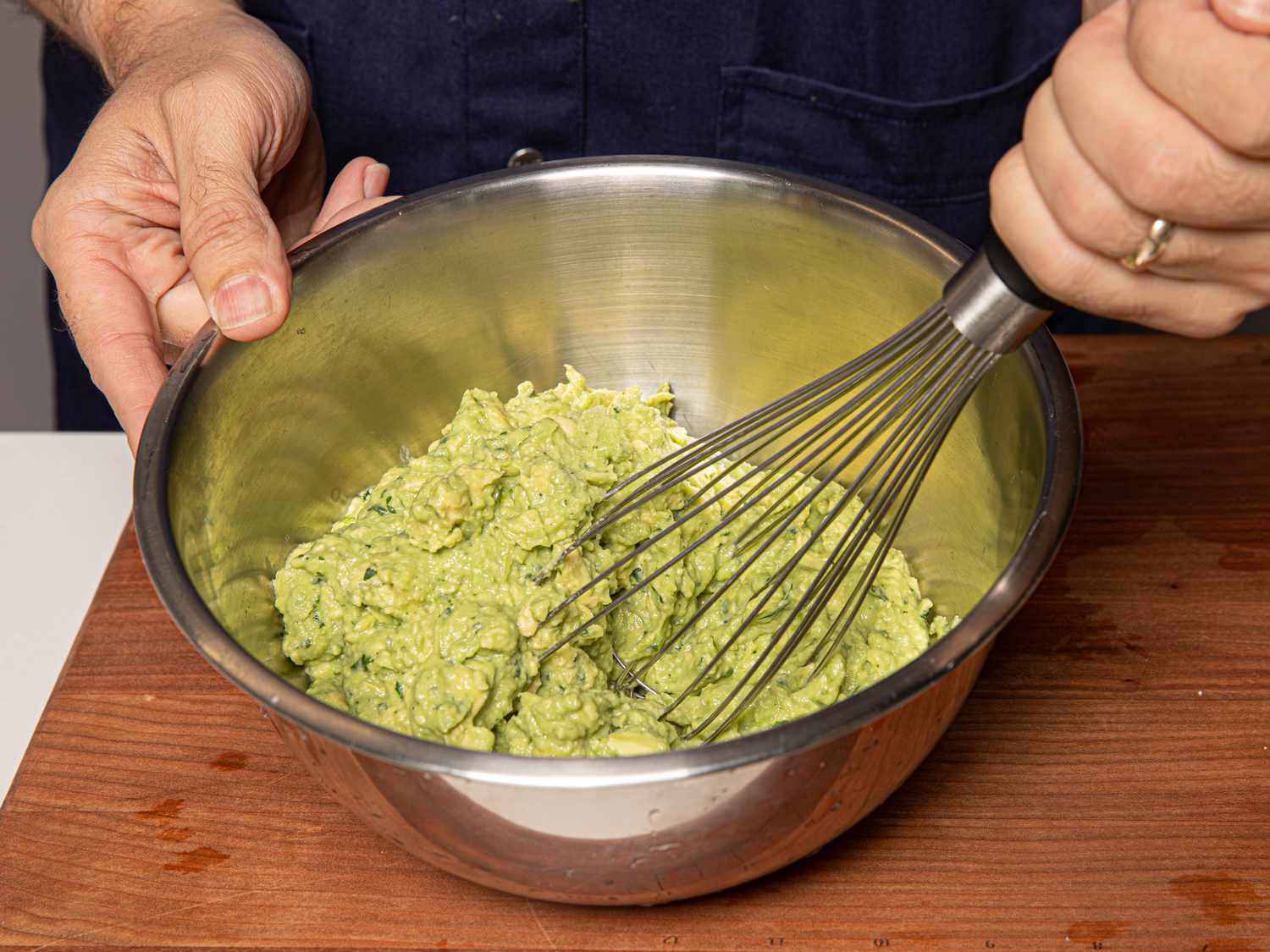 Overhead view of mashing with a whisk