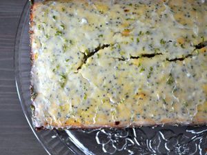Overhead closeup of Glazed key lime bread, served on a glass platter.