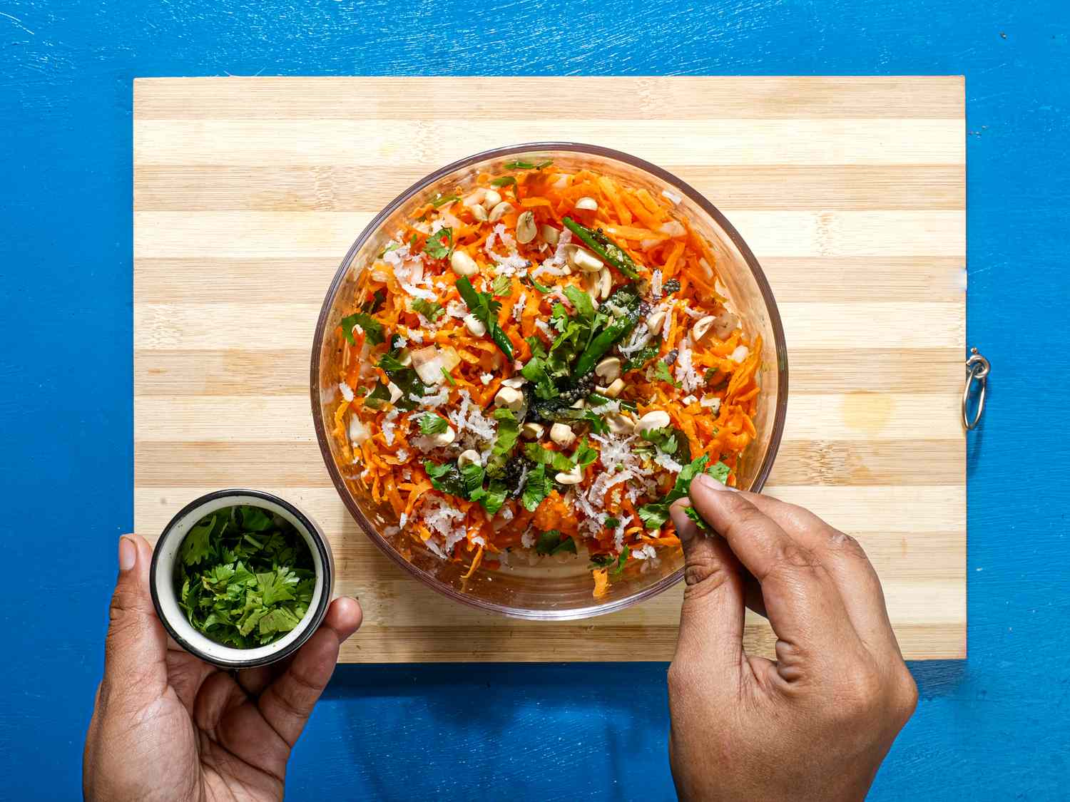 The finished salad is garnished with cilantro