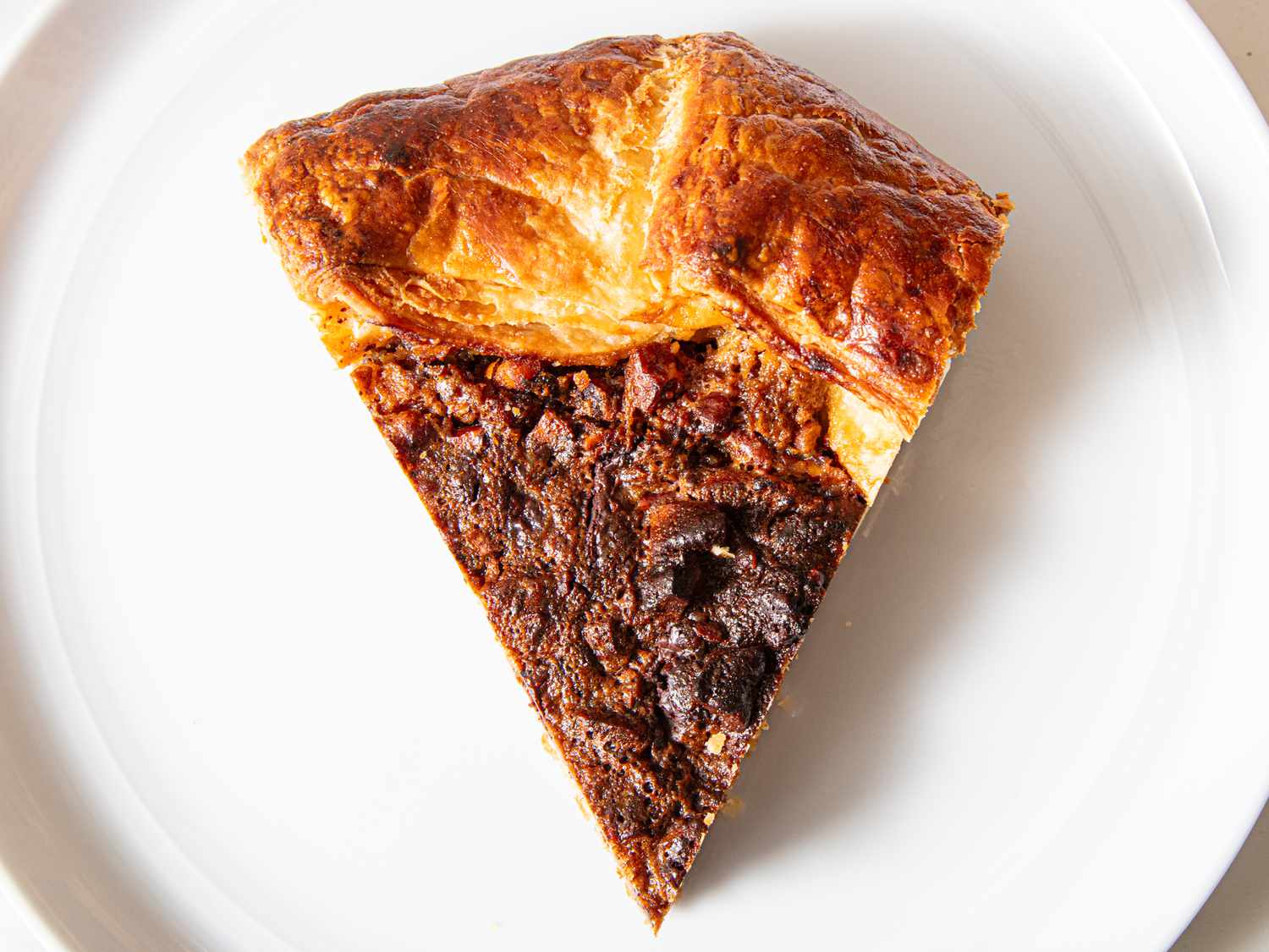 Chocolate pecan galette on a plate.