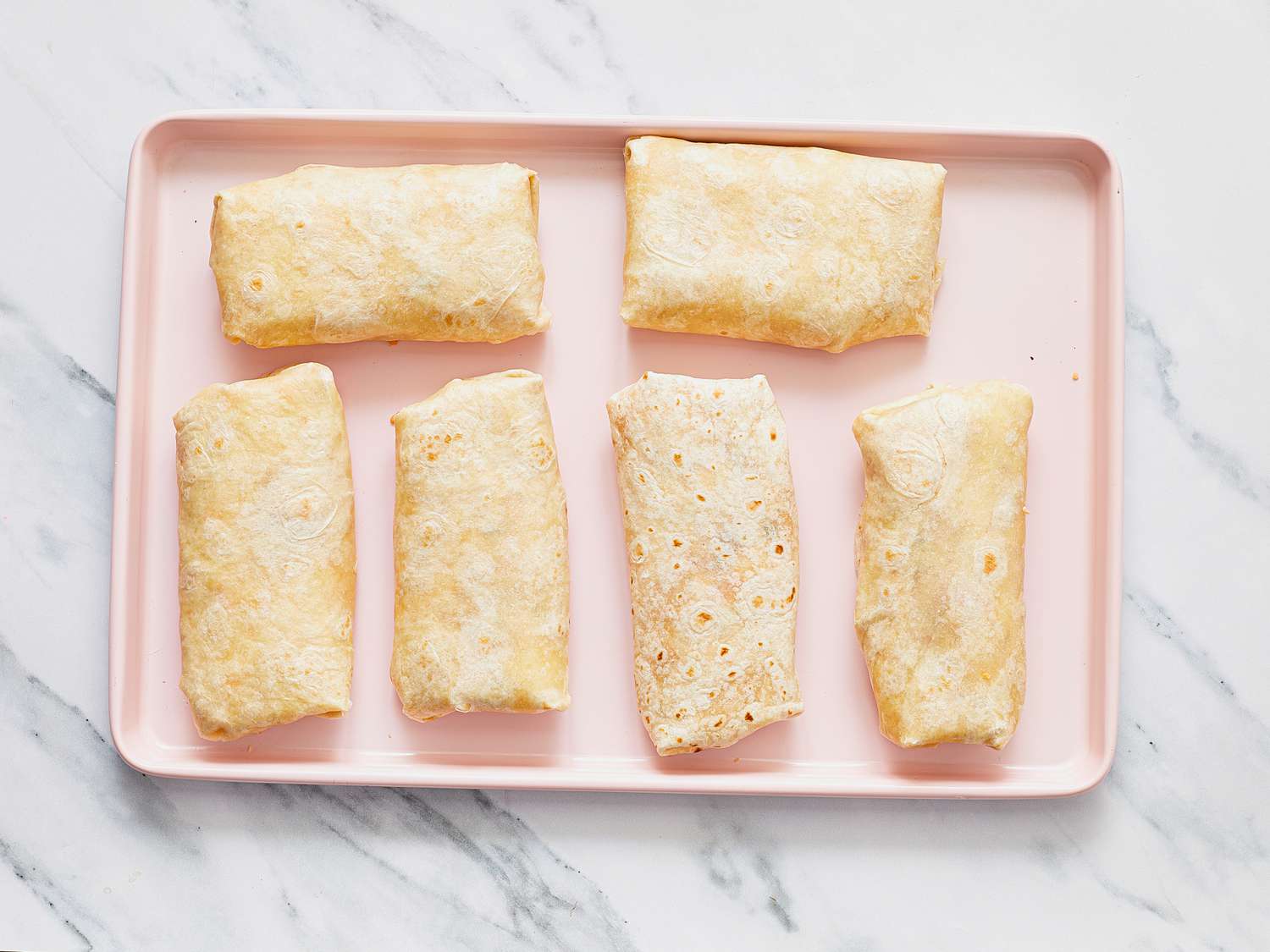 A tray of chimichangas