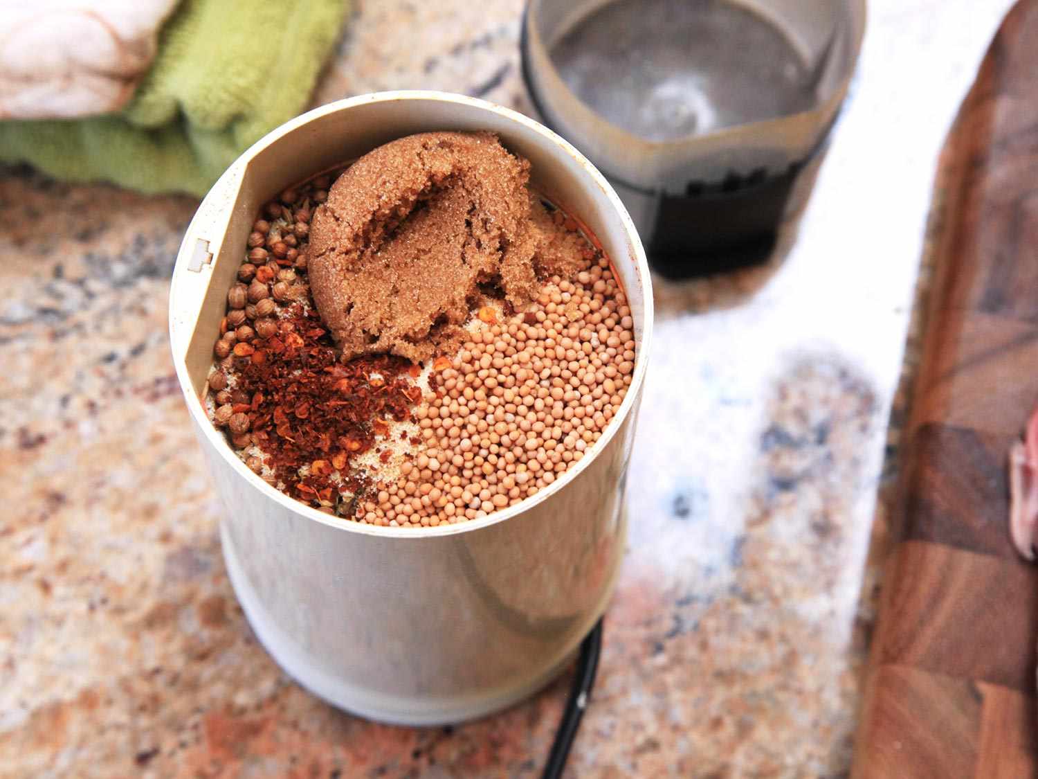 Sous vide pork dry rub spices in a spice grinder.