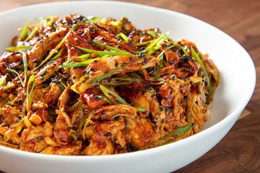 Close up view of a plate of hot and numbing Sichuan-style turkey salad. 