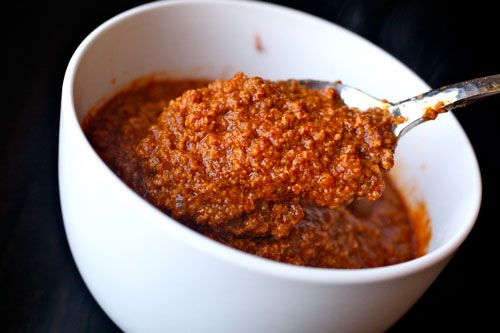The finished chili being scooped up with a spoon for the camera.