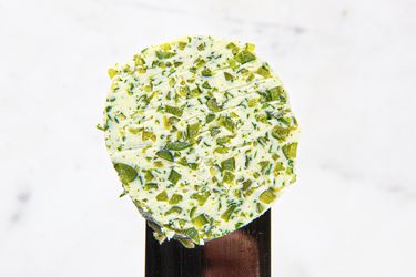 close-up of garlic scape butter