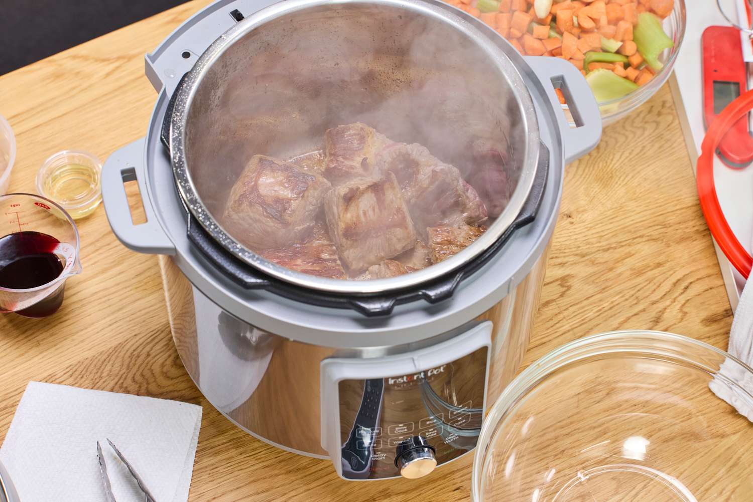 Steaming chunks of meat cook in the Instant Pot Duo Plus 8-Quart Multi-Use Pressure Cooker V4