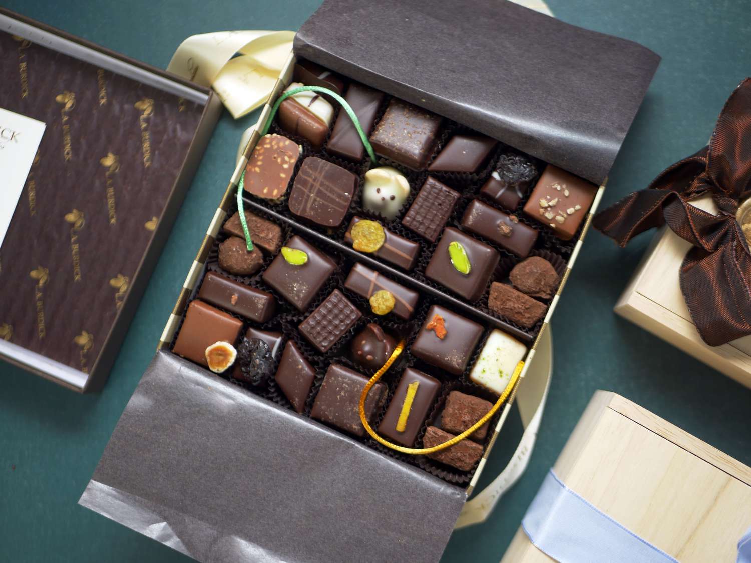 an open box of chocolates showcasing them