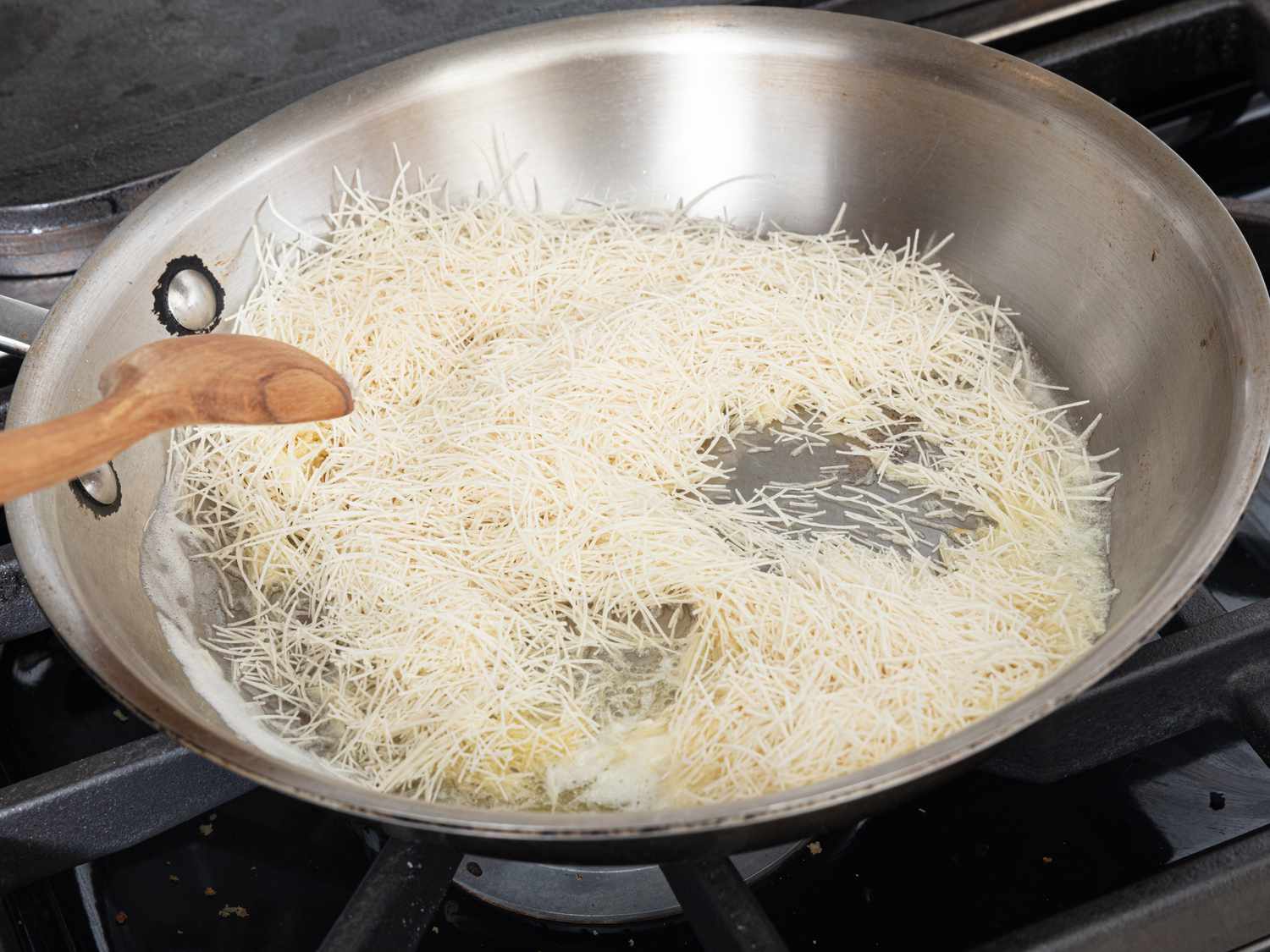 Overhead view of tossing filling