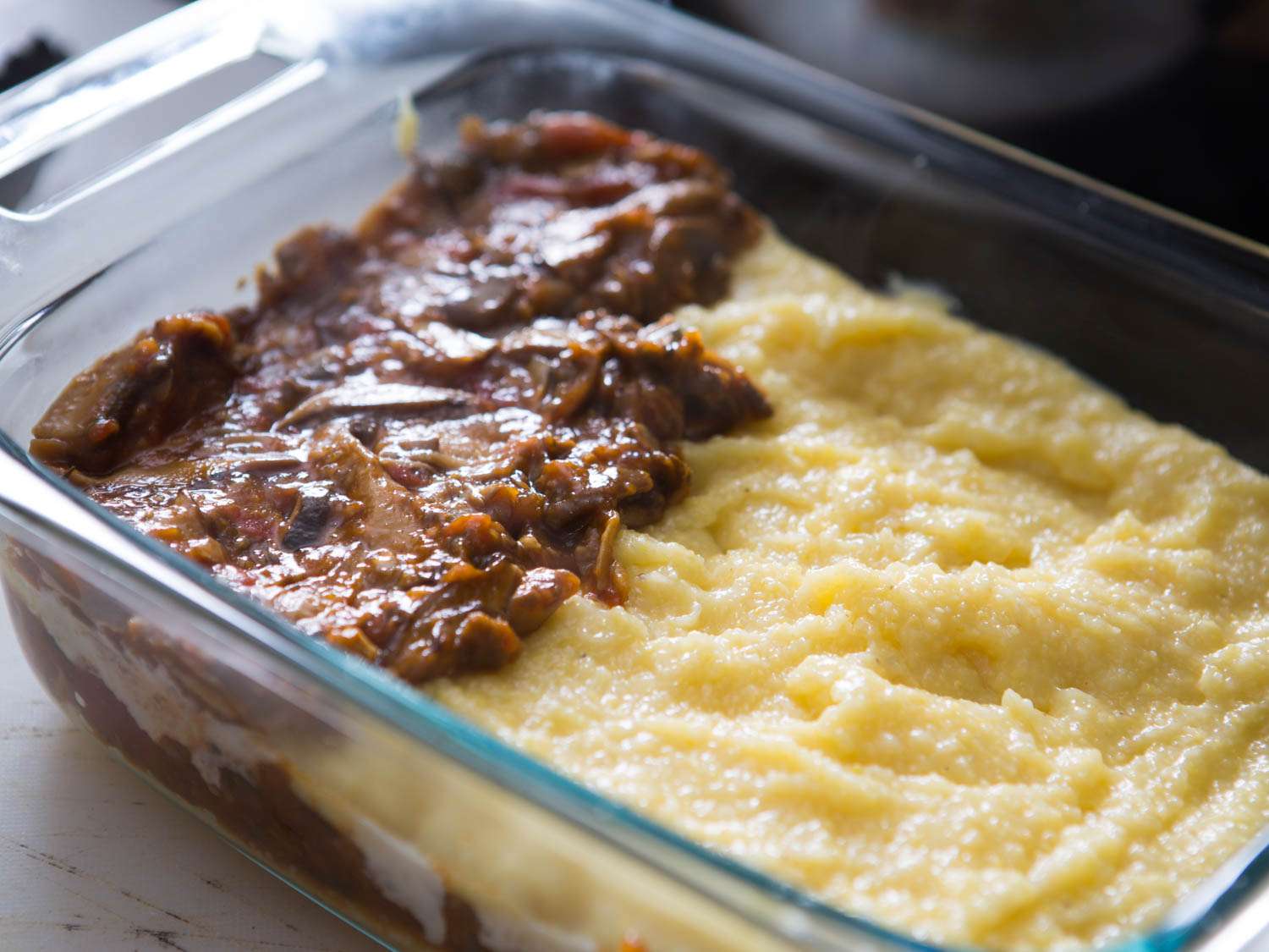 Mushroom ragù is spooned over a second layer of polenta.