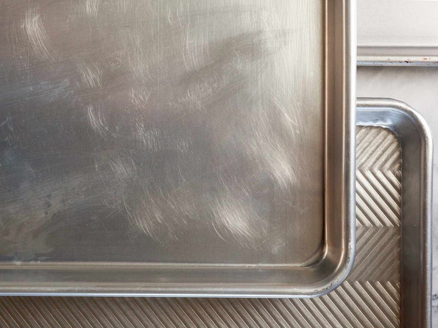 an aerial view of a few sheet pans stacked on top of each other 