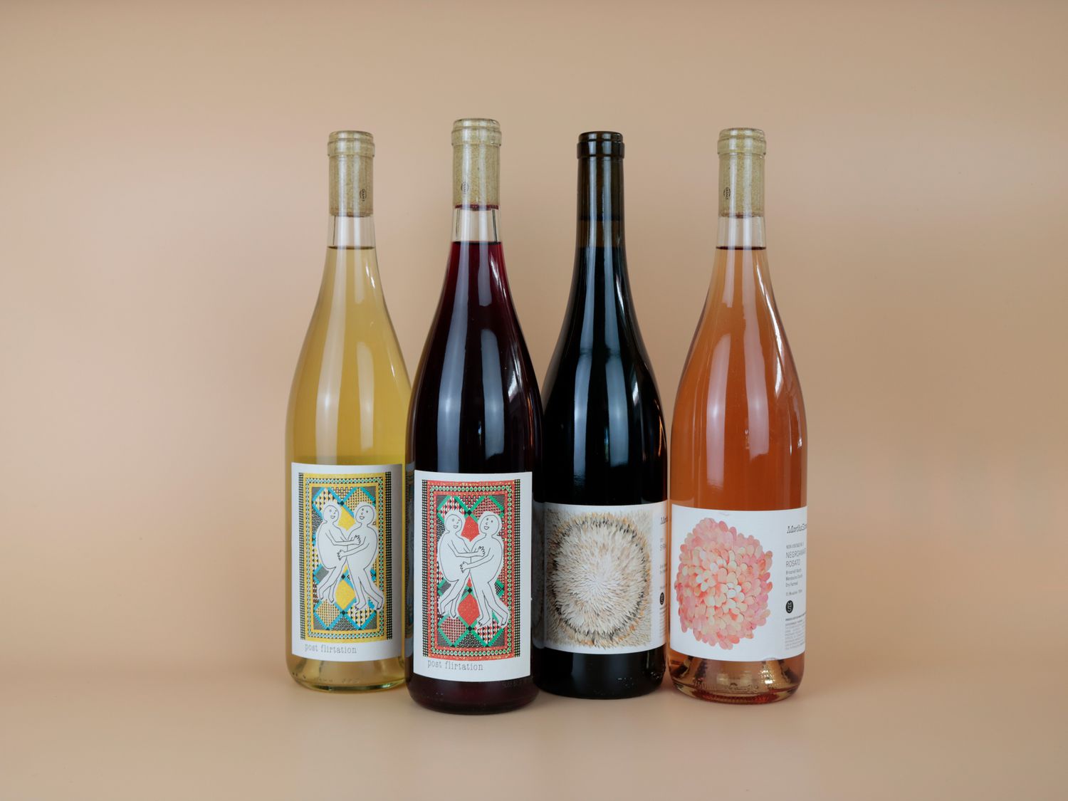 martha stoumen wine club featuring four bottles on a taupe backdrop