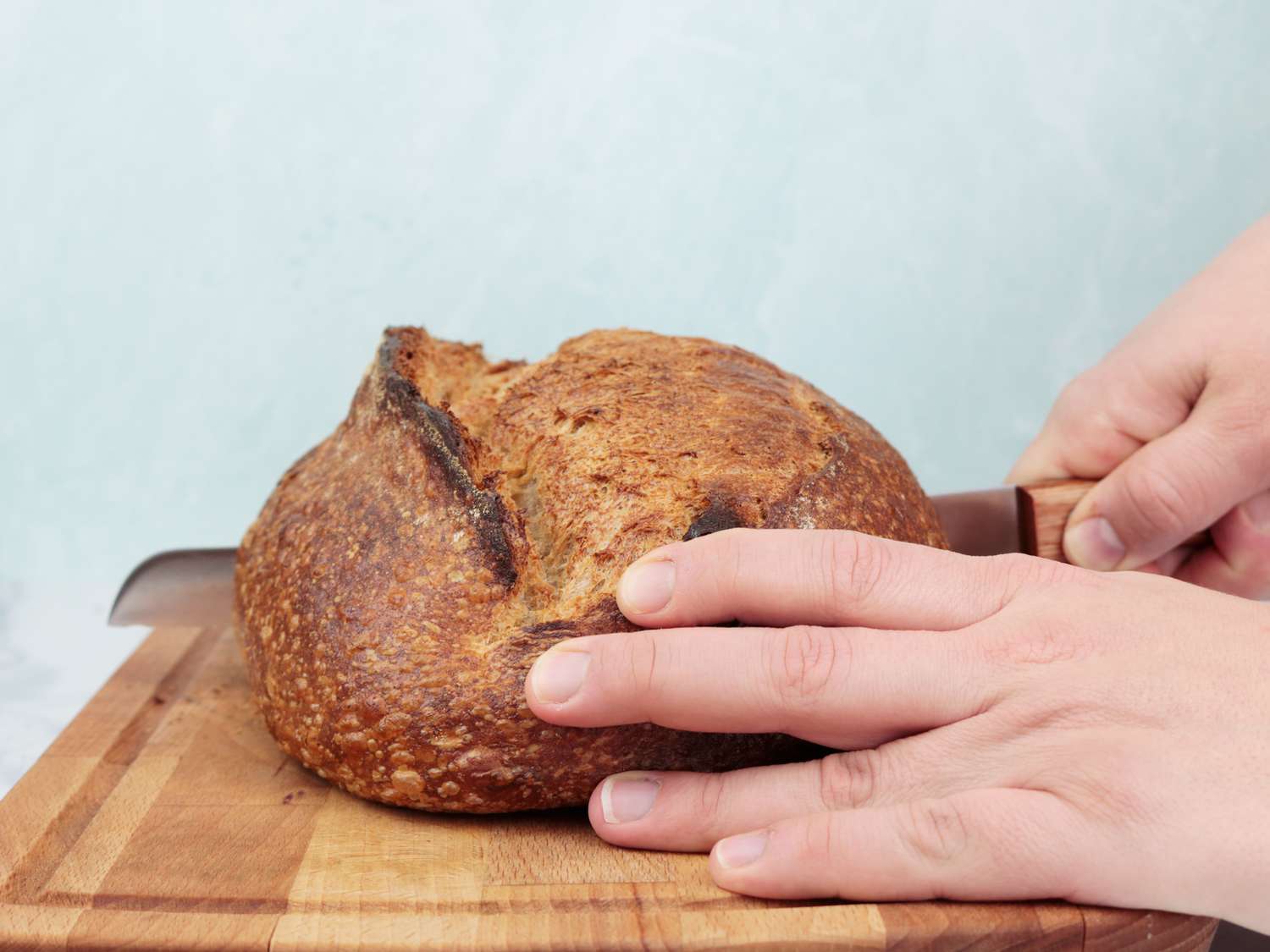 using the tojiro to slice a loaf of bread
