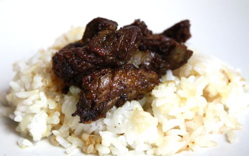 fried lamb kidneys over rice