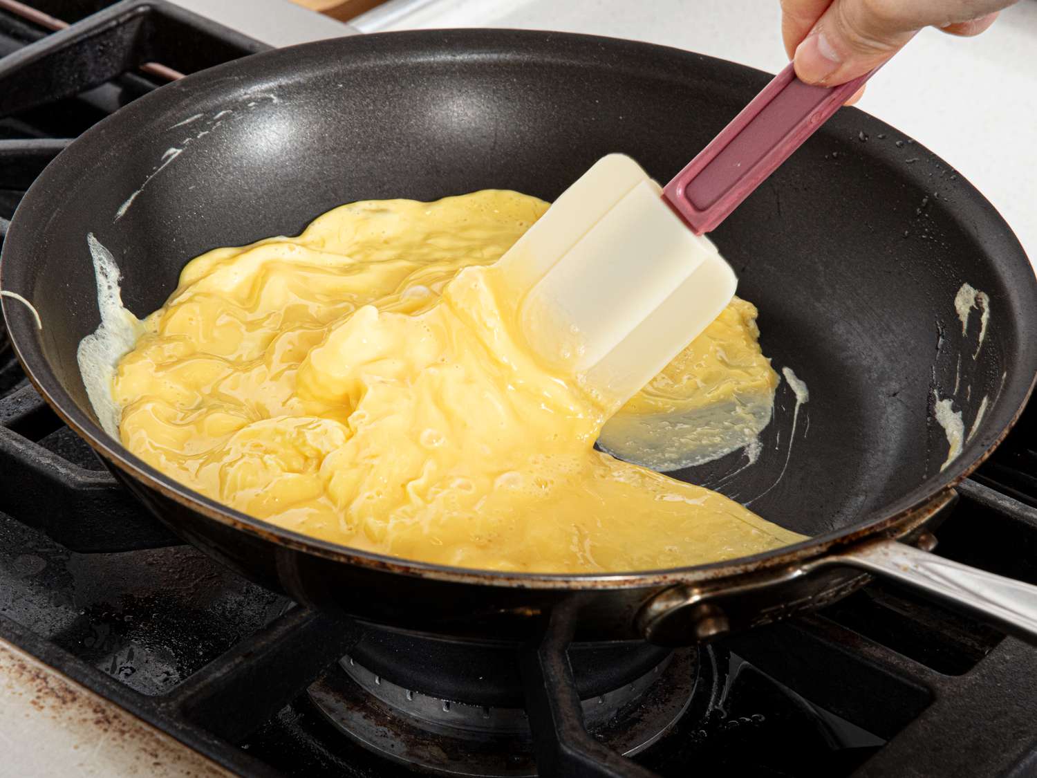 Side view of cooking eggs