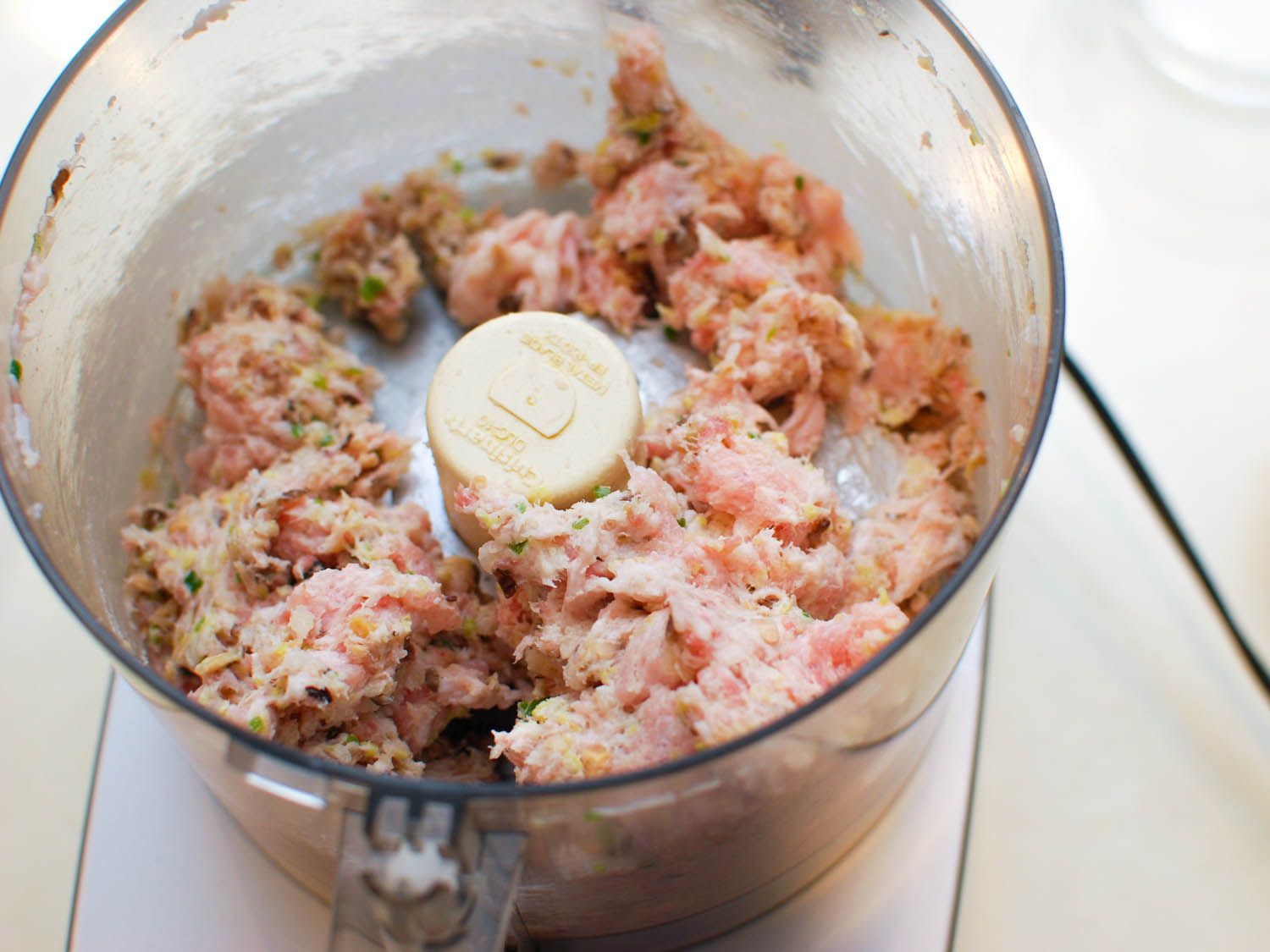 The filling for sheng jian bao is puréed in a food processor.
