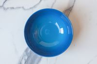 Le Creuset Stoneware Soup Bowl on a counter top