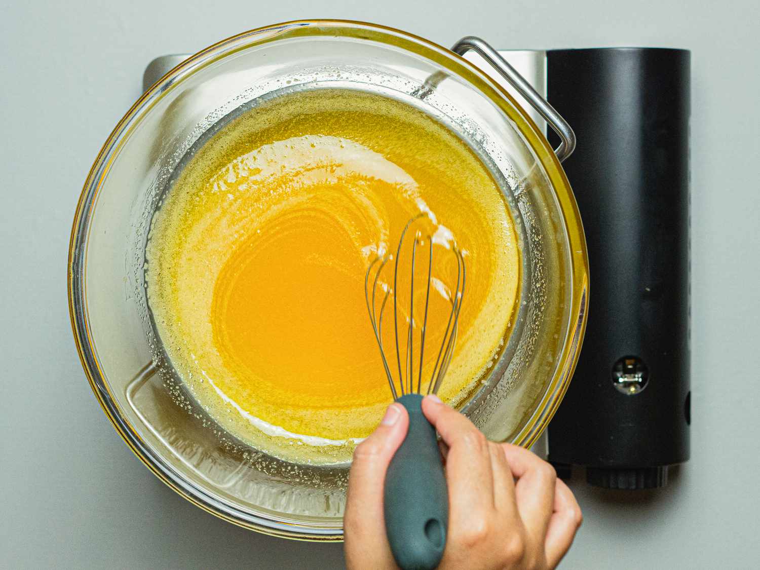 over head view od whisking eggs