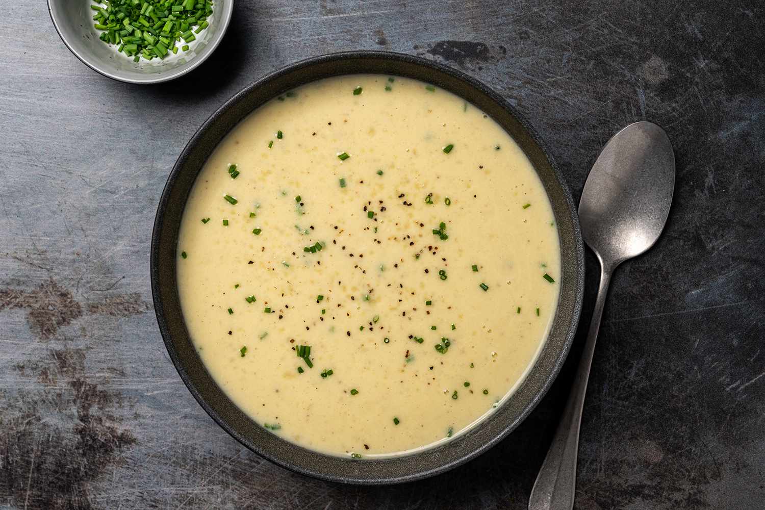 Overhead shot of a bowl of potato leek soup