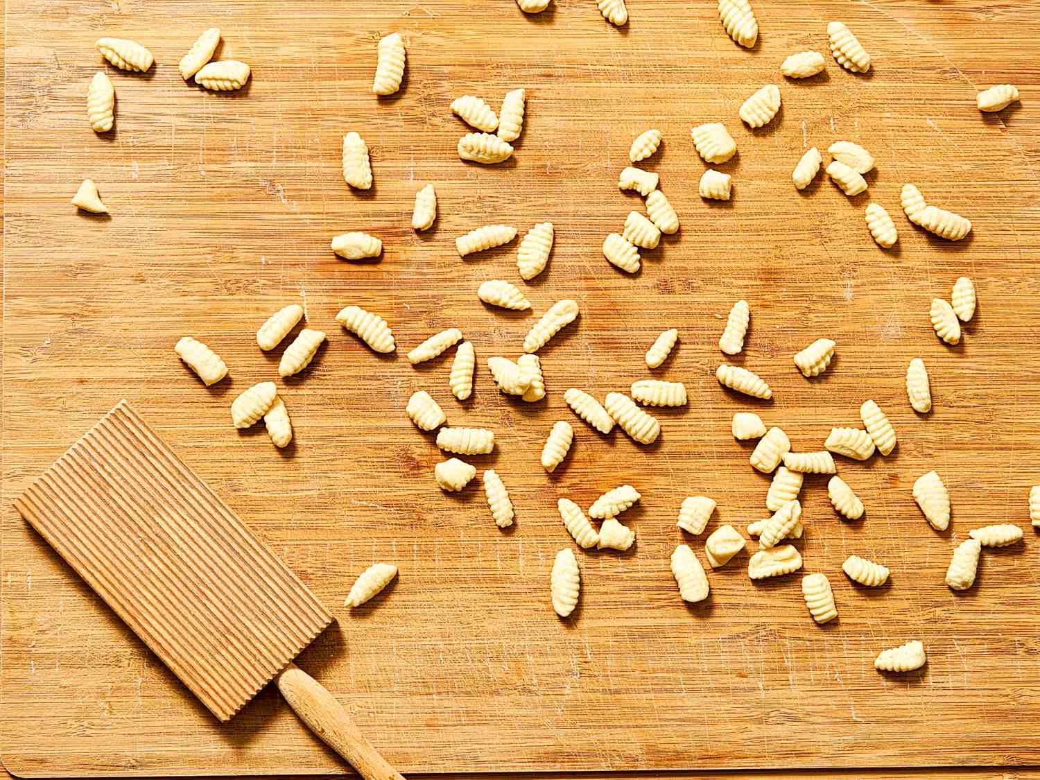 Gnocchi rolled on a cutting board